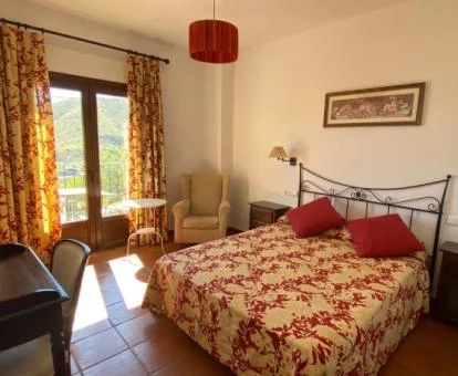 Una de las acogedoras habitaciones con vistas de este hotel boutique.