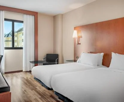 Una de las acogedoras habitaciones de estilo moderno de este precioso hotel.