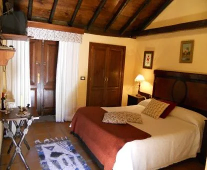 Una de las acogedoras habitaciones de estilo tradicional de este hotel rural.