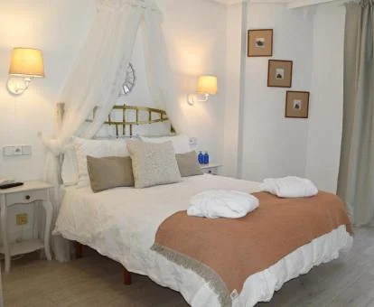 Una de las coquetas habitaciones de estilo tradicional del hotel.