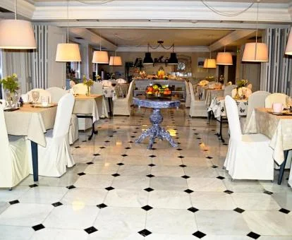 Elegante comedor de este coqueto hotel romántico.