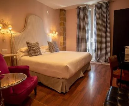 Una de las elegantes habitaciones de este coqueto hotel boutique.