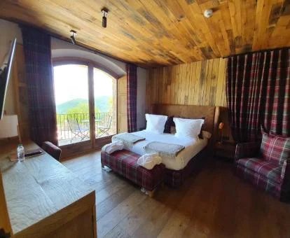 Acogedora habitación de tipo suite y estilo tradicional de este acogedor hotel boutique.