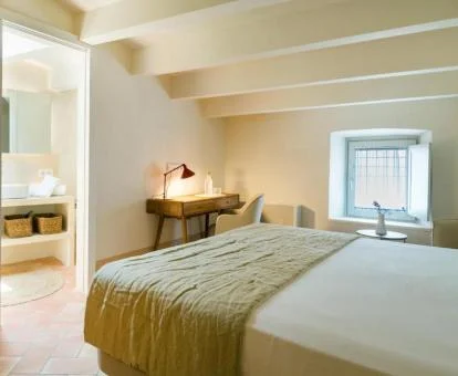 Una de las coquetas habitaciones de este acogedor hotel boutique.