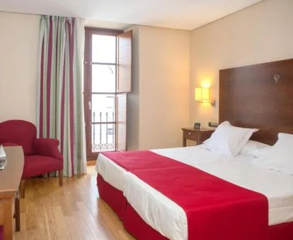 Una de las acogedoras habitaciones dobles de este coqueto hotel boutique.
