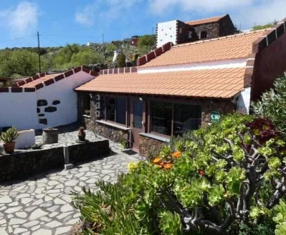 Preciosa casa rural con amplia zona exterior y jardín.