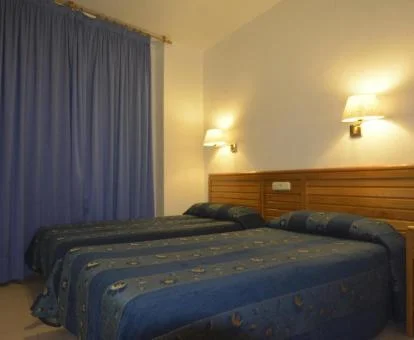 Una de las acogedoras habitaciones dobles de este sencillo hotel boutique.