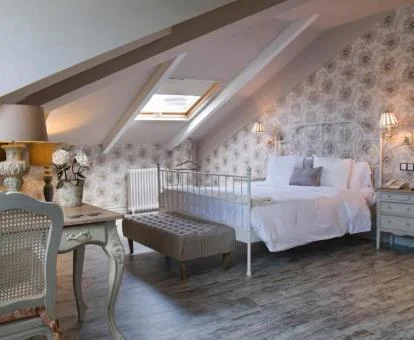 Una de las elegantes habitaciones de estilo clásico de este hotel boutique.