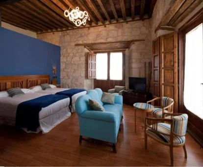 Una de las coquetas habitaciones de este romántico hotel rural.