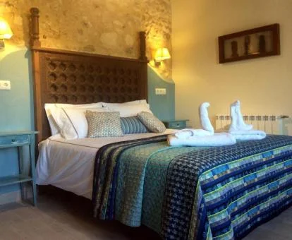 Una de las cómodas habitaciones dobles de este alojamiento rural.