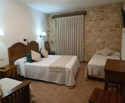 Una de las acogedoras habitaciones dobles de este alojamiento rural.