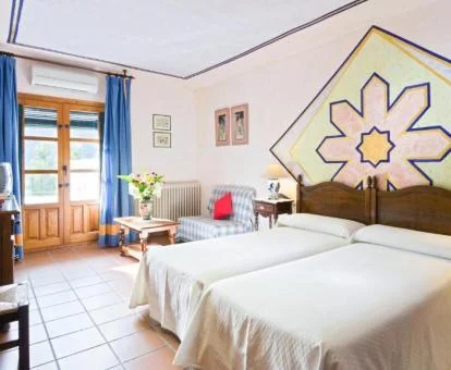 Una de las acogedoras habitaciones dobles del hotel.