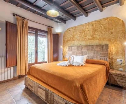 Una de las habitaciones de estilo tradicional de este hotel rural.