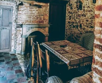 Uno de los coquetos rincones de esta casa rural independiente de estilo rústico.