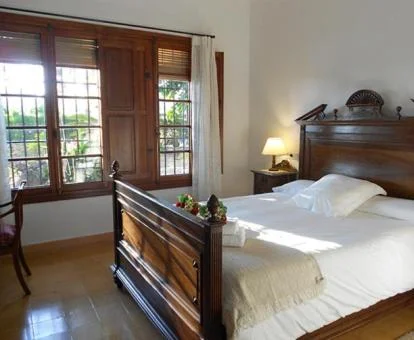 Una de las habitaciones de estilo tradicional de este coqueto hotel.