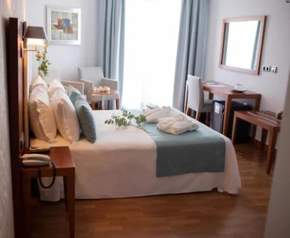 Una de las habitaciones dobles de este acogedor hotel.