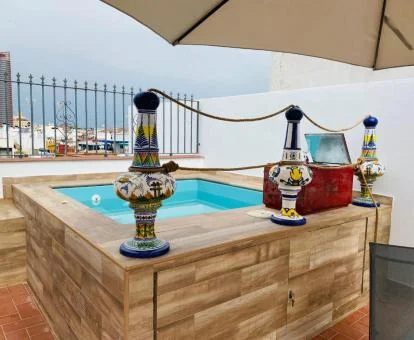 Maravilloso jacuzzi privado en la terraza de uno de los apartamentos del alojamiento.