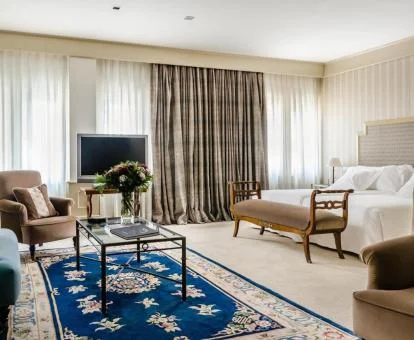 Una de las hermosas habitaciones con zona de estar de este hotel boutique.