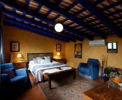 Una de las acogedoras habitaciones de estilo tradicional de este hotel rural.