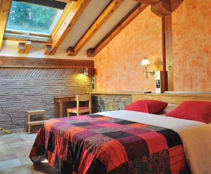 Una de las coquetas habitaciones dobles de este hotel rural.
