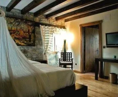 Una de las acogedoras habitaciones de estilo tradicional del hotel.