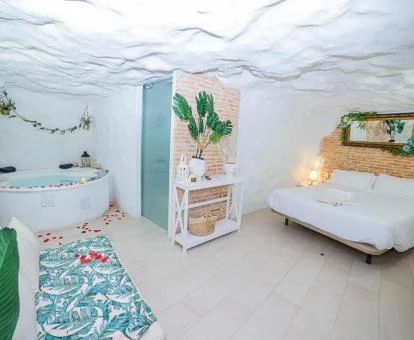 Suite Deluxe con bañera de hidromasaje ideal para parejas de este establecimiento.
