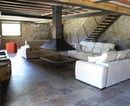 Uno de los acogedores espacios de uso compartido de este hotel boutique rural.