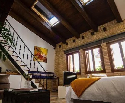 Una de las acogedoras habitaciones de esta preciosa casa rural en medio del pueblo.