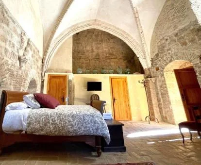 Una de las espectaculares habitaciones de estilo tradicional de este hotel rural.