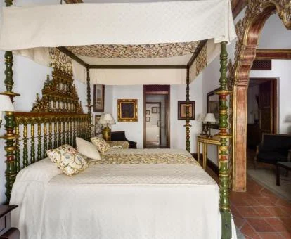Una de las elegantes habitaciones de un precioso estilo tradicional de este hotel boutique.