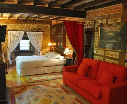 Una de las elegantes habitaciones de estilo tradicional del hotel.