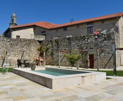 Edificio de este hotel romántico con zonas exteriores.