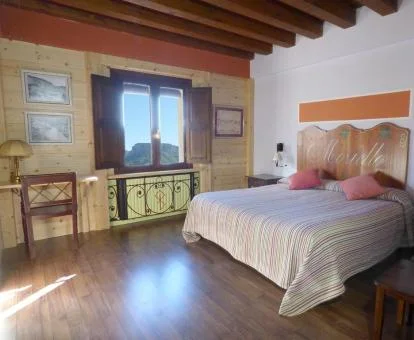 Una de las acogedoras habitaciones de estilo tradicional de este hotel rural.