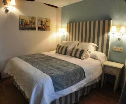 Acogedora habitación doble de este hotel boutique.