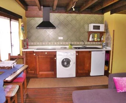 Interior de uno de los acogedores apartamentos del establecimiento.