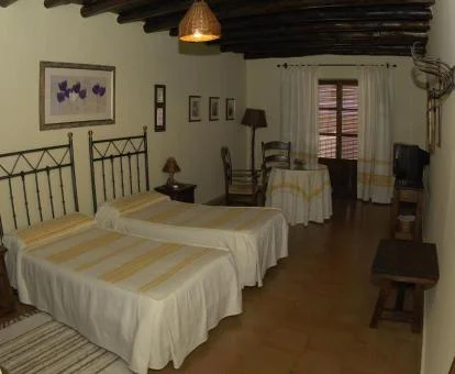 Una de las cómodas habitaciones de estilo tradicional del hotel.