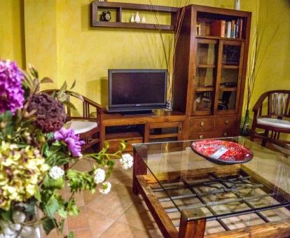 Uno de los acogedores espacios compartidos de este precioso hotel romántico.