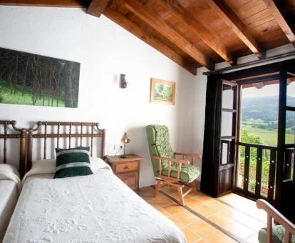 Una de las coquetas habitaciones con vistas al campo que rodea el hotel.