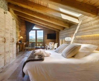 Una de las fabulosas habitaciones de estilo tradicional con vistas al campo que rodea el hotel.